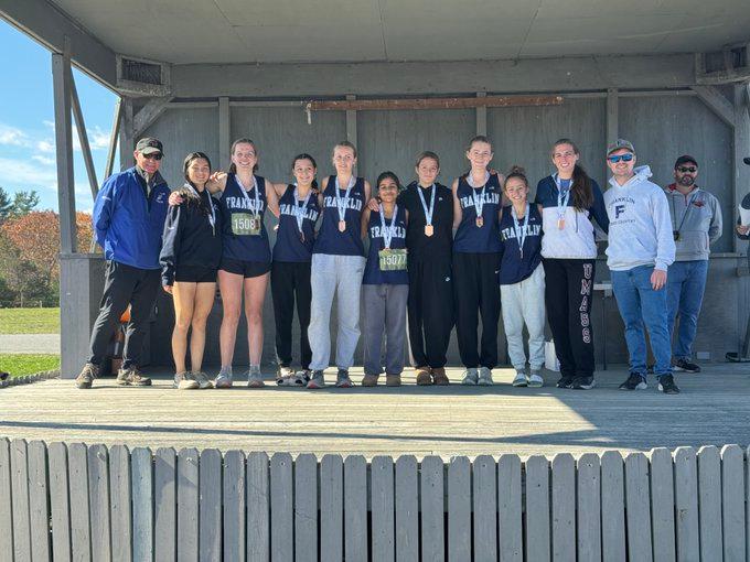 Franklin girls cross country team on the awards stand
